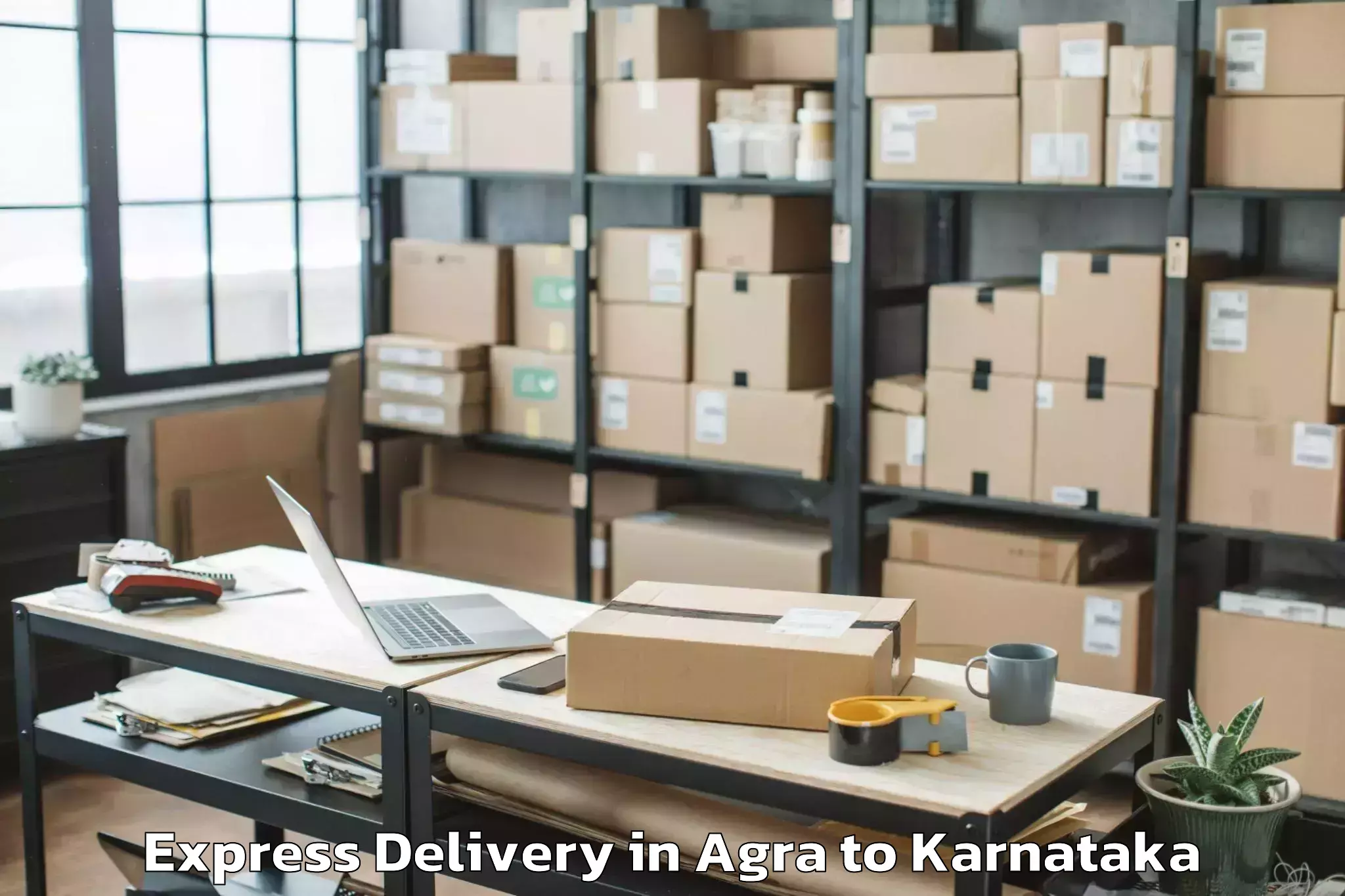 Get Agra to Sri Devaraj Urs Academy Of Hig Express Delivery